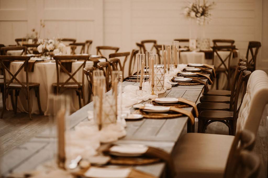 Farm table set for dinner at wedding at Providence Vineyard wedding venue