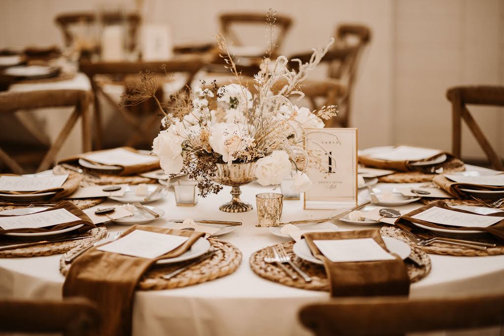 Florals and dinner table set at wedding at Providence Vineyard wedding venue