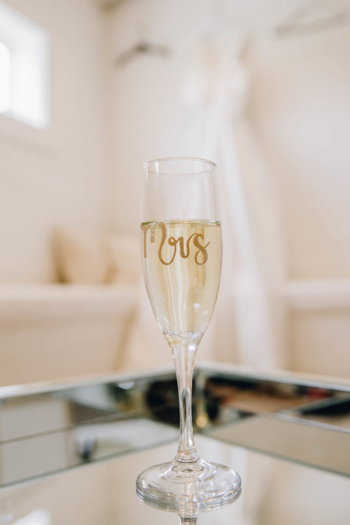 champagne glass labeled Mrs bridal suite at PRovidence Vineyard wedding venue