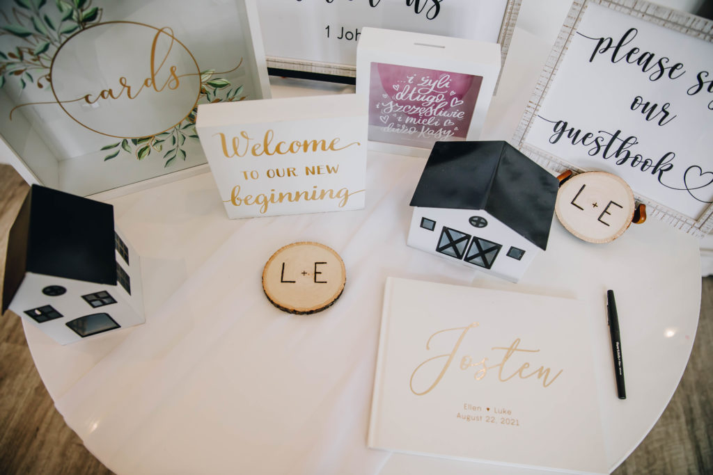 Welcome card signs signature book table at wedding at Providence Vineyard Wedding Venue