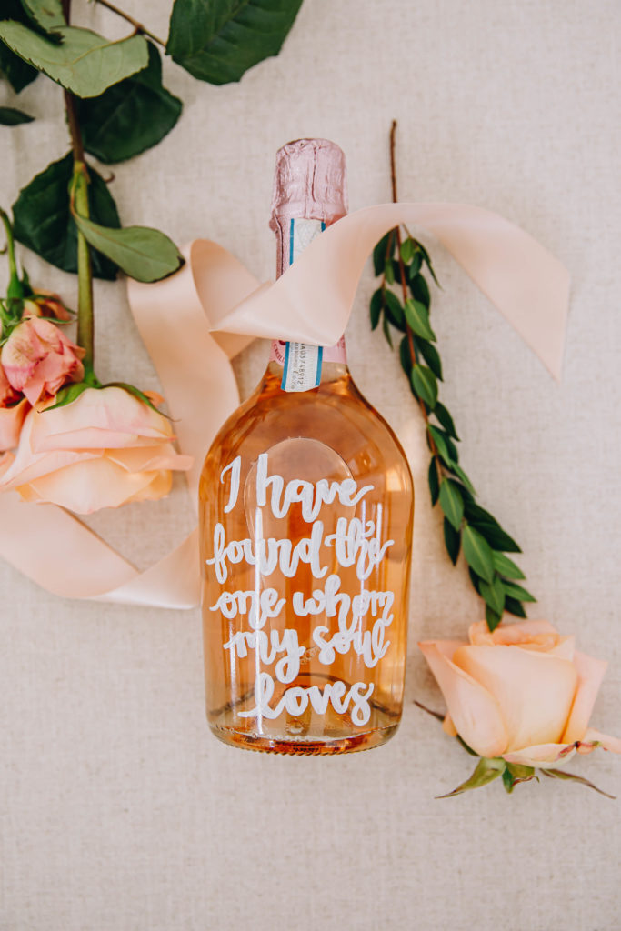 alcohol bottle with writing wedding decor at wedding at Providence Vineyard Wedding Venue